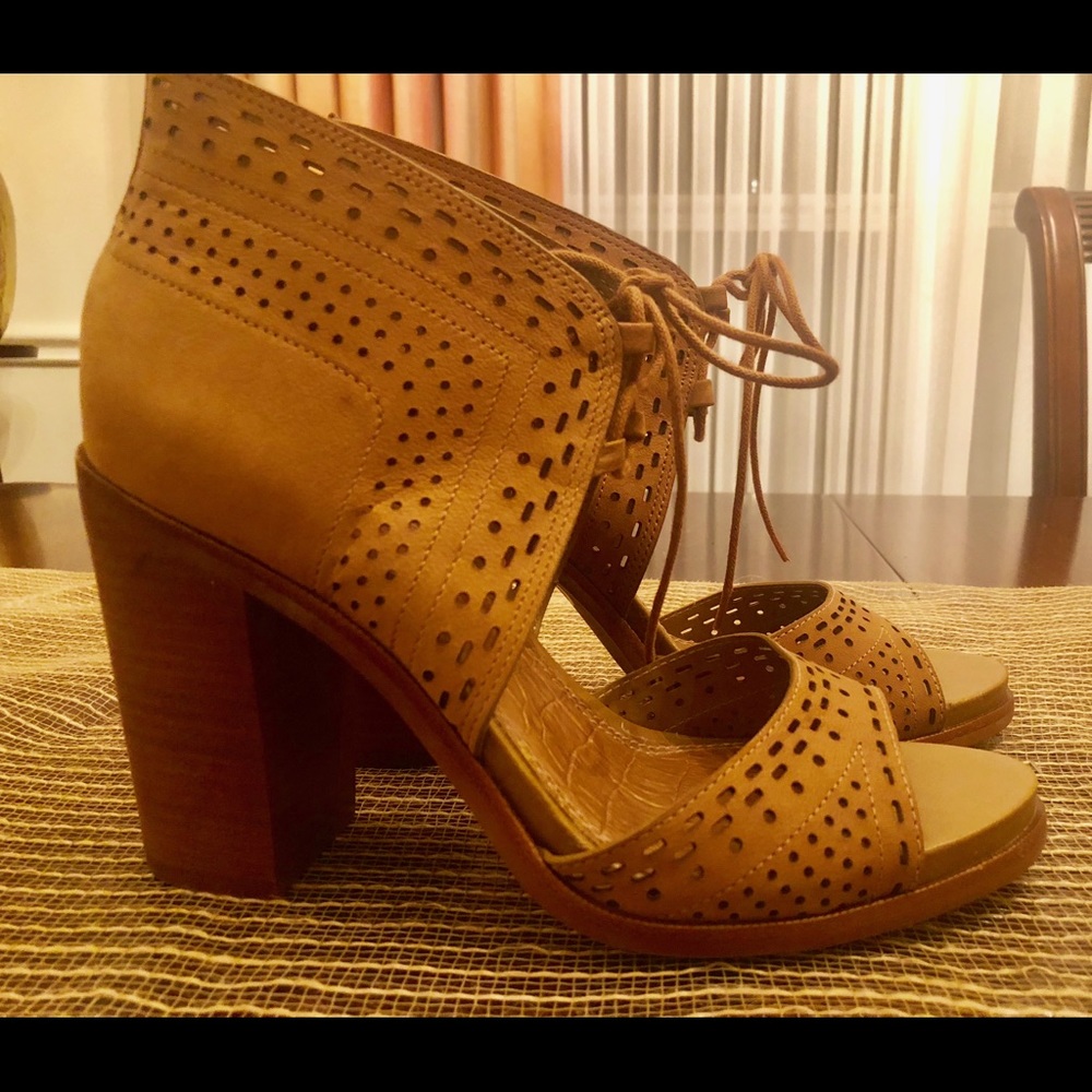 Brand new 1. State tie up bootie heels.